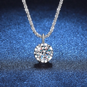 Sparkling S925 sterling silver crown necklace with a 1 carat round cut moissanite pendant