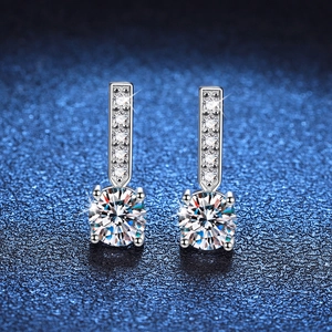 Elegant S925 sterling silver drop earrings featuring moissanite stones and starry background
