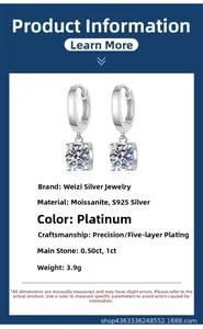 Macro shot of S925 sterling silver moissanite stud earrings in platinum finish