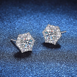 Luxurious S925 sterling silver hexagonal moissanite stud earrings on a starry blue background