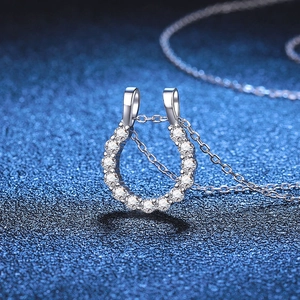 Elegant S925 sterling silver horseshoe necklace with moissanite crystals on blue background