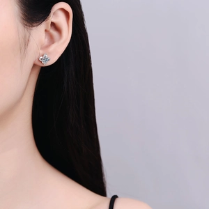 Elegant S925 silver moissanite stud earrings featuring a four-leaf clover floral design