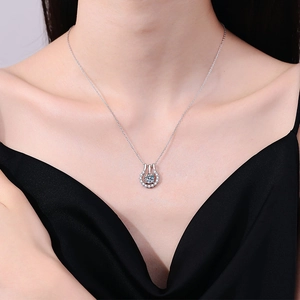 S925 Sterling Silver Moissanite Necklace worn by model on black v-neck dress