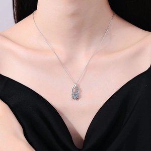 Elegant S925 sterling silver sunflower pendant necklace with moissanite on a model