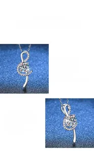 Detailed shot of S925 silver treble clef pendant with moissanite and polished finish
