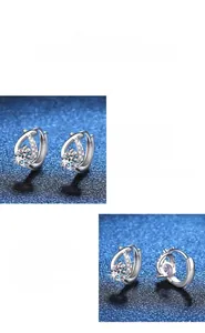 Macro shot of S925 sterling silver cross earring featuring a pear-cut moissanite stone