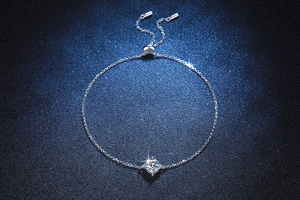Macro detail of S925 sterling silver adjustable bracelet with 1ct moissanite center stone