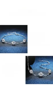 Detailed macro view of 1.5 carat round-cut D-color moissanite stones set in silver chain