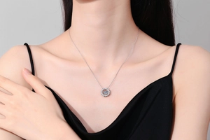 Close-up of S925 sterling silver necklace with a sparkling 1 carat moissanite pendant