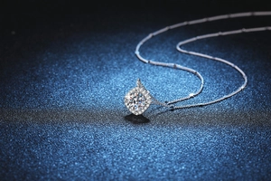 Macro shot of 1 carat Moissanite square pendant on a delicate S925 silver chain