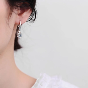 Elegant s925 sterling silver drop earrings featuring 1 carat round moissanite stones