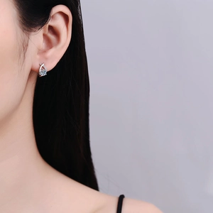 Elegant S925 sterling silver crossover stud earring with sparkling round moissanite for women