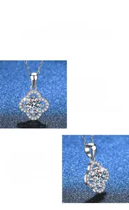 Macro shot of 1 carat moissanite four-leaf clover pendant with exquisite polishing detail