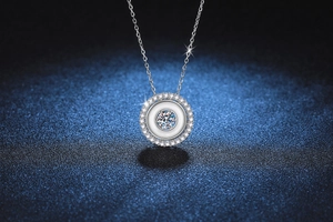 Detailed macro shot of S925 silver necklace with white shell and moissanite pendant
