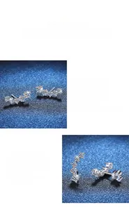 Macro detail of S925 sterling silver moissanite stud earrings with polished smile curve