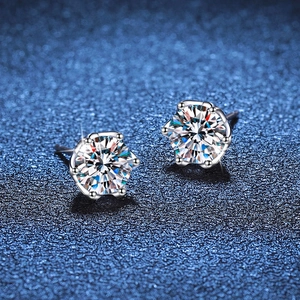Classic 925 sterling silver stud earrings featuring six-prong moissanite in starry background