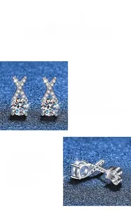 Detail of X-shaped S925 sterling silver stud earrings with round moissanite stones