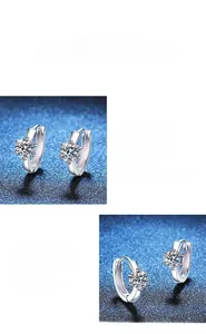 Dettaglio macro di orecchini a cerchio in argento S925 con moissanite a taglio brillante