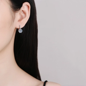Classic 2ct D color moissanite drop earrings in S925 sterling silver on model side view