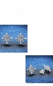 Dettaglio macro degli orecchini a fiocco di neve in moissanite e argento S925