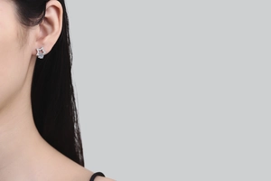 Detailed view of S925 sterling silver star stud earring with brilliant moissanite stone