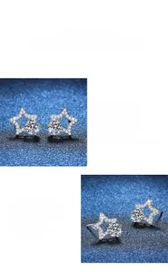 Macro detail of star-shaped moissanite earrings showing polished silver finish