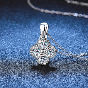 Elegant S925 sterling silver four-leaf clover necklace featuring brilliant round moissanite