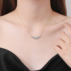 Minimalist S925 sterling silver necklace with gold plating and seven curved moissanite stones