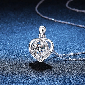 S925 silver heart necklace with 1-carat moissanite pendant on a starry blue background