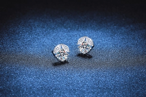 Macro shot of S925 sterling silver flower earrings with brilliant D color moissanite