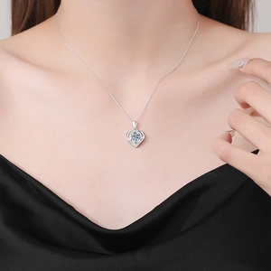 Elegant S925 sterling silver heart pendant necklace featuring a brilliant 1ct moissanite stone