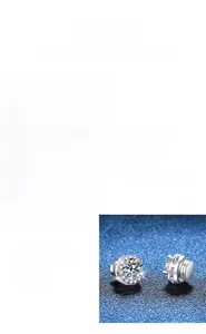 Macro view of brilliant-cut moissanite stud earring with premium polished silver finish