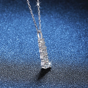 Elegant S925 sterling silver necklace featuring five graduated moissanite stones on a chain