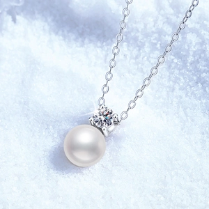 Elegant s925 sterling silver necklace with a large round freshwater pearl and moissanite