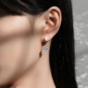 Elegant S925 silver stud earrings featuring a round pearl and a square zircon pendant