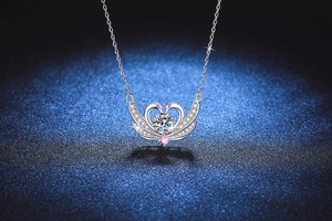 Macro view of S925 silver swan pendant with 1 carat moissanite and pink gemstones