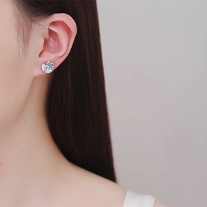 Elegant S925 sterling silver flower stud earrings with D color moissanite on ear
