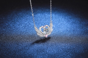 Macro shot of S925 silver double swan heart pendant with 1ct moissanite center stone