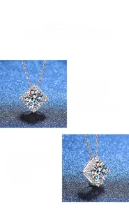 Macro d'un collier pendentif en moissanite en argent sterling S925 serti à quatre griffes