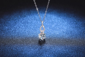 Macro shot of S925 silver gourd necklace with 1-carat moissanite stone and diamond accents