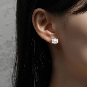 Classic s925 sterling silver stud earrings featuring natural white pearl with sunflower halo