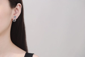 Elegant S925 sterling silver drop earrings with moissanite and pavé interlocking circles
