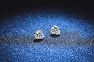 Macro shot of S925 sterling silver camellia flower earrings with brilliant moissanite center