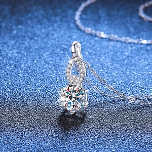 S925 sterling silver gourd pendant necklace with 1 carat round moissanite on blue background