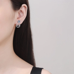 S925 sterling silver moissanite drop earrings featuring double overlapping pavé circles