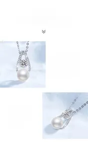 Gros plan détaillé d'une perle d'eau douce et d'un pendentif moissanite en argent S925