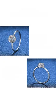Macro detail of six-prong moissanite engagement ring setting with polished silver band