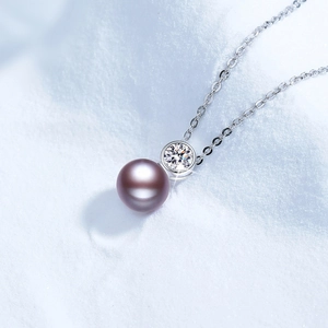 Elegant s925 silver necklace with purple freshwater pearl and moissanite pendant on snow