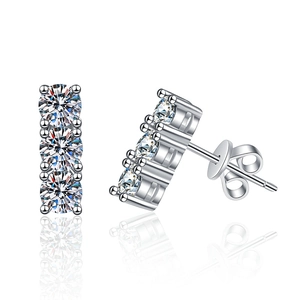 Minimalist S925 sterling silver stud earrings with three Moissanite stones in a vertical setting