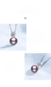 Macro detail of natural lavender freshwater pearl and moissanite stone on silver chain